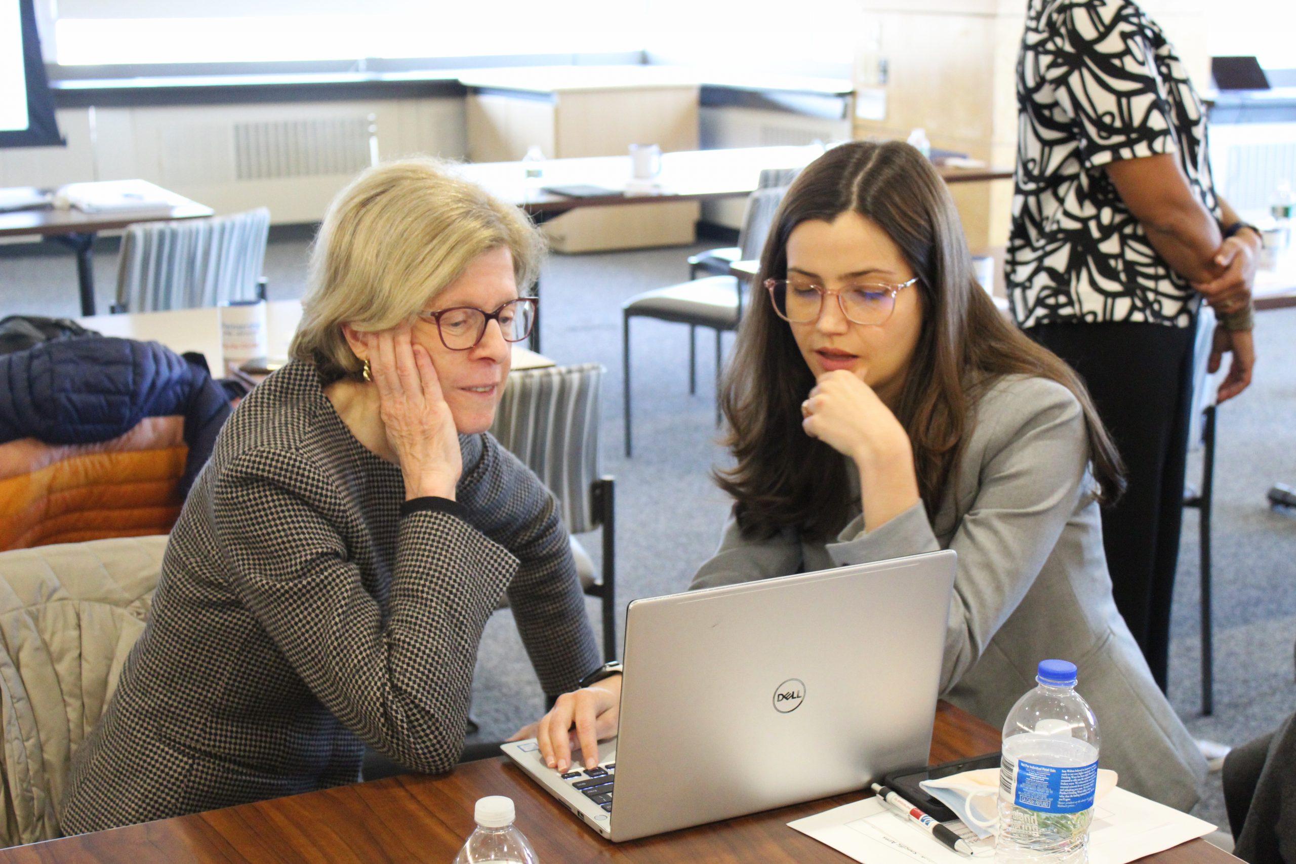 photo10 Two Principal Investigators look at a computer.